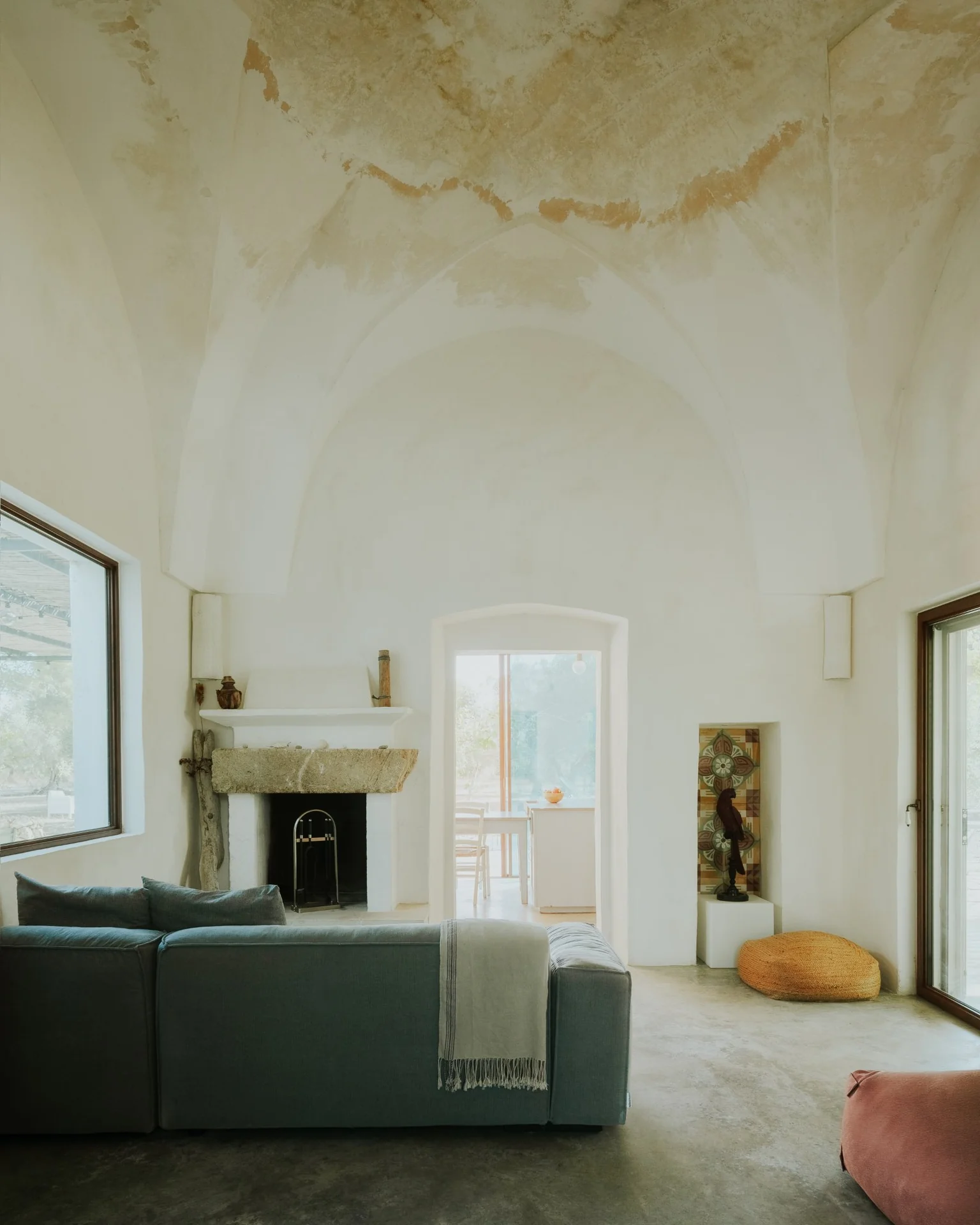 Living room beneath the original vaulted ceiling